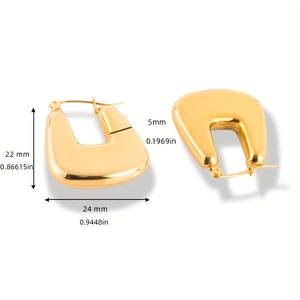 Detailed view showing dimensions of golden U-shaped chunky hoop earrings with snap closure