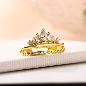 Elegant gold-plated crown ring featuring marquise-cut zircons and an adjustable band