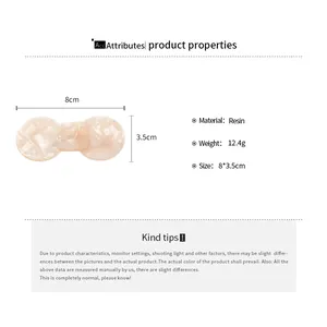 Size chart showing 8x3.5cm dimensions for the cream marble resin bow hair clip