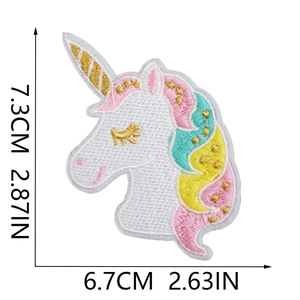 Detailed embroidery size chart of the colorful unicorn patch measuring 7.3cm by 6.7cm