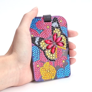 DIY 5D diamond painting luggage tag with colorful butterfly and floral rhinestone pattern