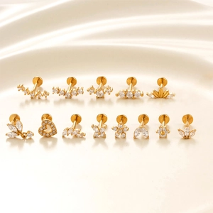 Golden stainless steel stud earrings set with zircon flowers and heart shapes on silk