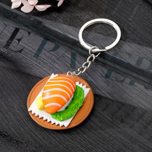 Realistic salmon sushi keychain with silver metal ring and detailed resin food charm