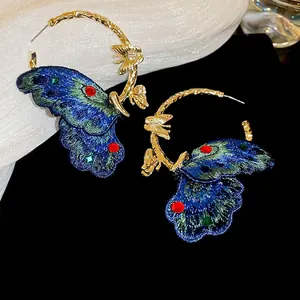 Peacock blue embroidery butterfly hoop earrings with gold metal and colorful gems