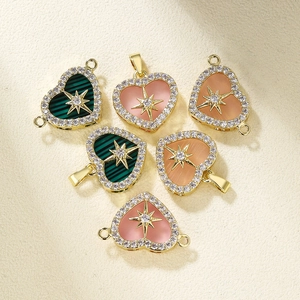 Gold-plated heart pendants with micro-set zircon, green and pink stones, and star motifs