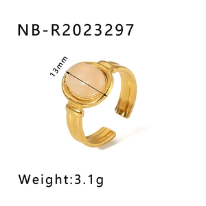 Detail view of gold stainless steel ring with 13mm translucent pink natural stone inlay