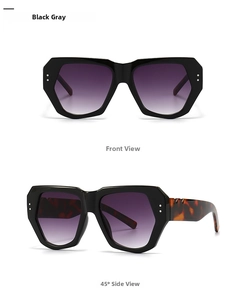 Detail of butterfly rivet sunglasses with black frame and purple gradient lenses