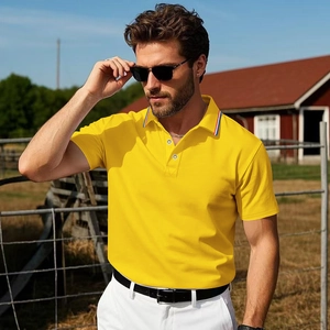 Detail of yellow polo shirt collar with red, white and blue stripes in outdoor sunlight