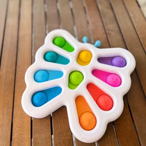 Macro shot of butterfly pop-it toy with numbered silicone bubbles for tactile learning
