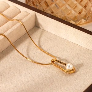 Elegant gold-plated stainless steel necklace with a hollow teardrop pearl pendant
