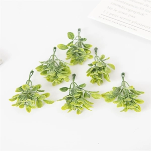 Detail view of 6 artificial green succulent leaves for DIY Christmas crafts decoration