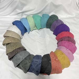 Detailed circular array display of over twenty colors of vintage washed cotton baseball caps