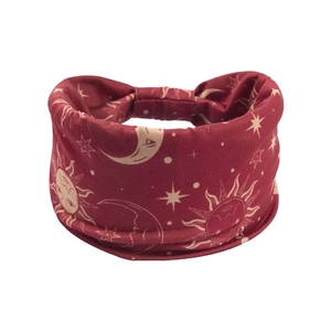 Bohemian burgundy elastic headband with celestial sun and moon patterns for sports