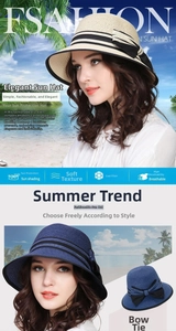 Detail of wide brim straw sun hat with black bow and metal accent on beach background