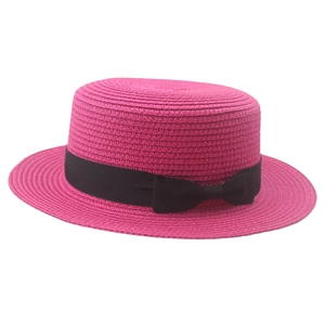 Detailed macro view of the rose red boater hat with a black decorative ribbon bow