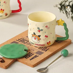 Christmas ceramic mug set with lid and spoon featuring reindeer and star handle detail