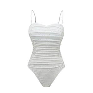 White eyelet textured one-piece swimsuit with spaghetti straps and ruched tummy control