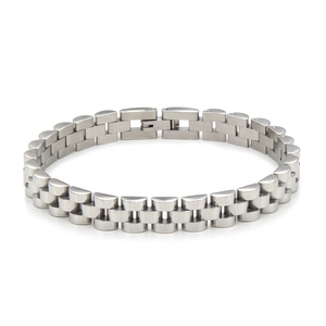 Detailed macro view of silver stainless steel president-style watch strap links