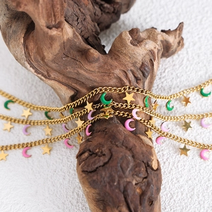 French vintage star and moon jewelry set with gold chain and colorful charms