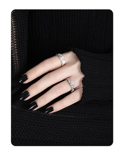 Close-up of S925 sterling silver rings with vine design and sparkling inlaid diamond stones