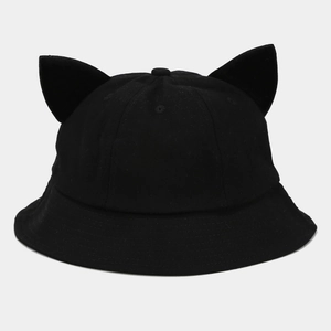 Detailed close-up of cute devil ears and fine stitching on a black cotton bucket hat