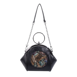 Black chain crossbody shell bag with round metal handle and elephant embossed pattern