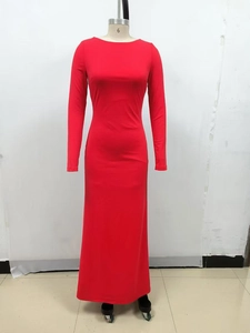 Detail of red long-sleeve maxi dress with round neck and slim fit jersey fabric