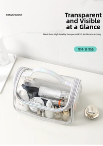 Detail of transparent PVC makeup bag with holographic trim on white marble