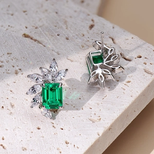 Elegant emerald-cut green crystal stud earrings with cubic zirconia in silver-tone setting