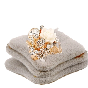 Golden flower butterfly open ring with clear crystals and white resin petals