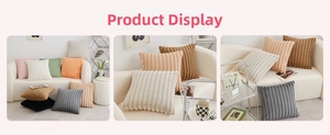 Detailed view of plush corduroy pillow covers featuring vertical striped 3D texture and soft fabric