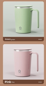 Detail view of electric stirring coffee mug with handle and secure lid in green and pink