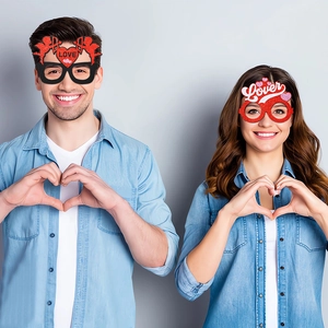 Valentine's Day party glasses with red hearts and Cupid designs for couples