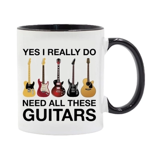 Ceramic guitar theme mug with black handle and music quote on white background