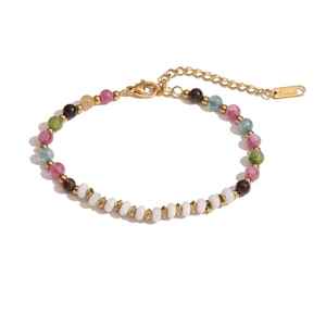 Colorful beaded stainless steel bracelet with 18K gold plated spacers on white background