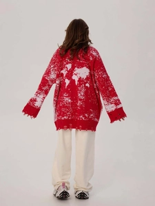 Oversized red knit cardigan with white world map back print and distressed hem detailing