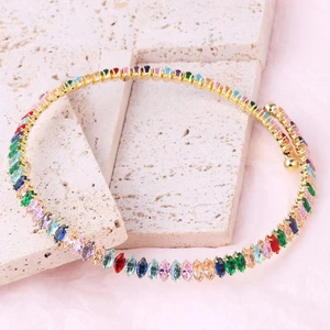 Colorful marquise-cut gemstone necklace with gold plating and spiral geometric design
