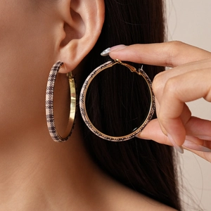 Retro geometric round hoop earrings with gold metal and brown checkered fabric texture