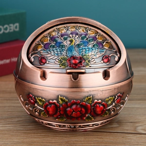 Vintage bronze round metal ashtray featuring peacock and peony flower relief carving with lid