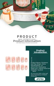 Close-up of Christmas snowflake press-on nails with glitter stars and rhinestones