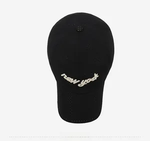 Top view of a black breathable mesh baseball cap featuring white New York embroidery