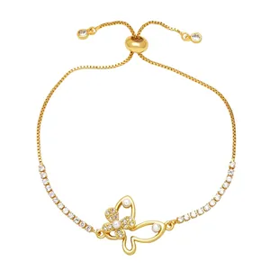 Elegant gold butterfly bracelet with white pearls and adjustable slider chain closure