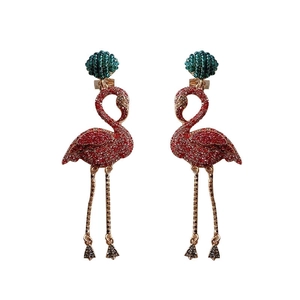 Sparkling pink rhinestone flamingo tassel earrings with emerald beads in gold finish
