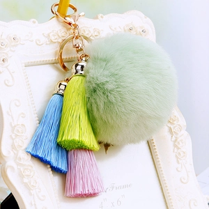 Ice silk tassel and light green plush pom pom keychain with gold hardware for handbags