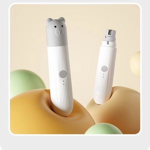 Detail view of the quiet electric pet nail grinder with a cute bear protective cover
