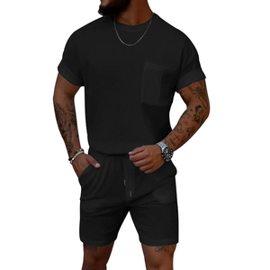 Men's black waffle knit summer set with crew neck short sleeve shirt and drawstring shorts