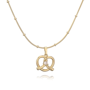 Golden pretzel heart necklace with clear zircon stone on a beaded chain with reflection