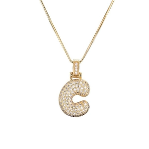 Detail of gold-plated necklace with micro-pave zircon letter C pendant on box chain