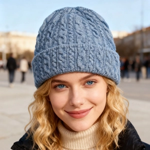 Classic light blue cable knit beanie hat for winter warmth with thick ribbed texture