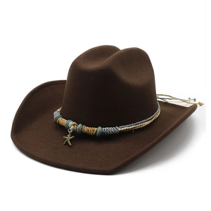 Detail of western wool hat with ethnic woven band and starfish pendant decoration